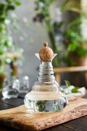 Bouchon en bois d'olivier sur carafe Alladin